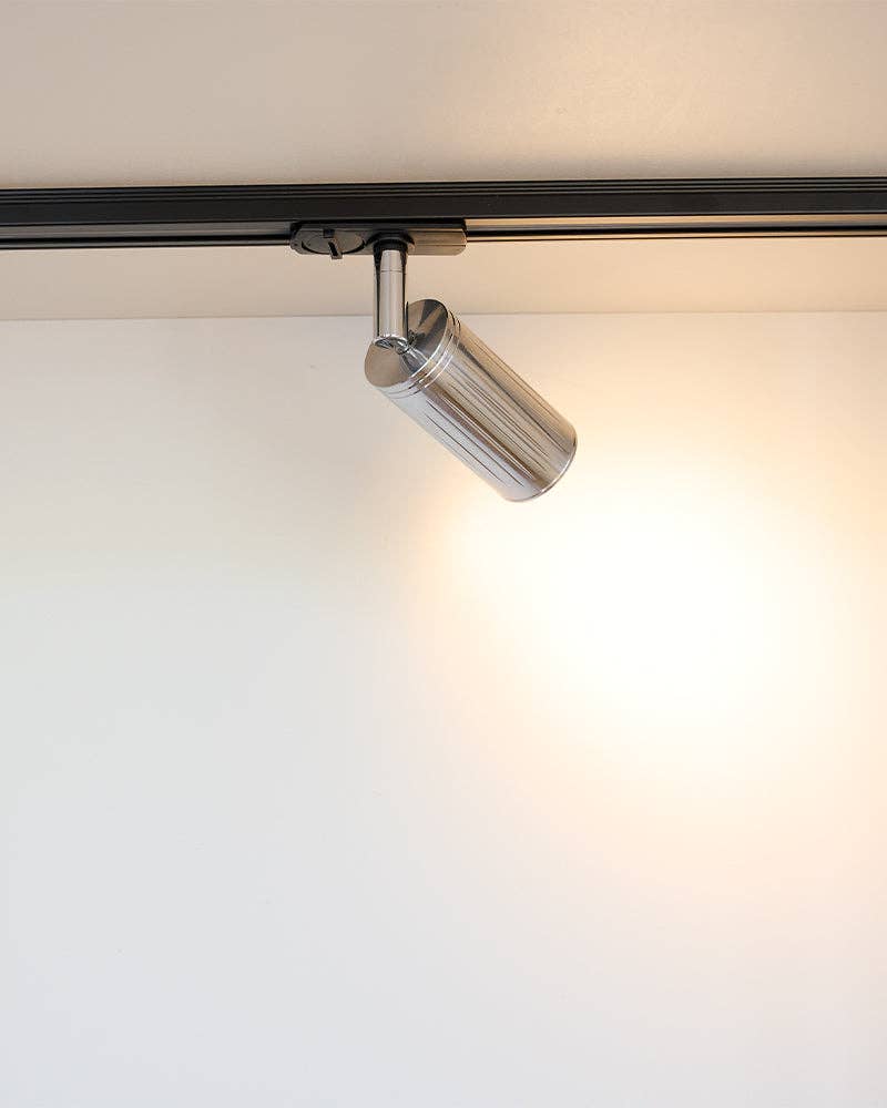 Luminar Track Mount Spotlight — Steel in a room