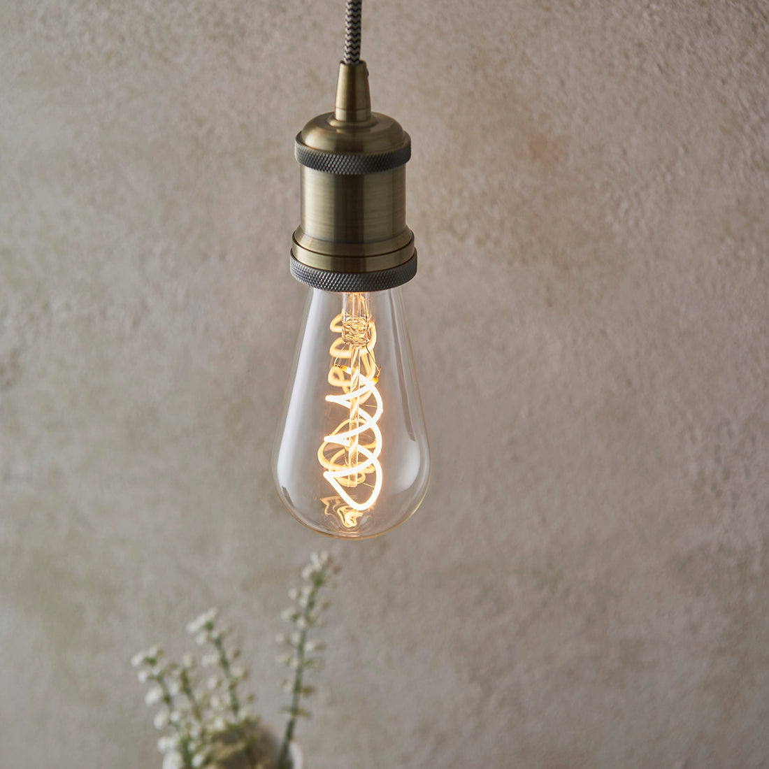 How Helios Double Spiral E27 LED Bulb — Warm White, Dimmable lights a room