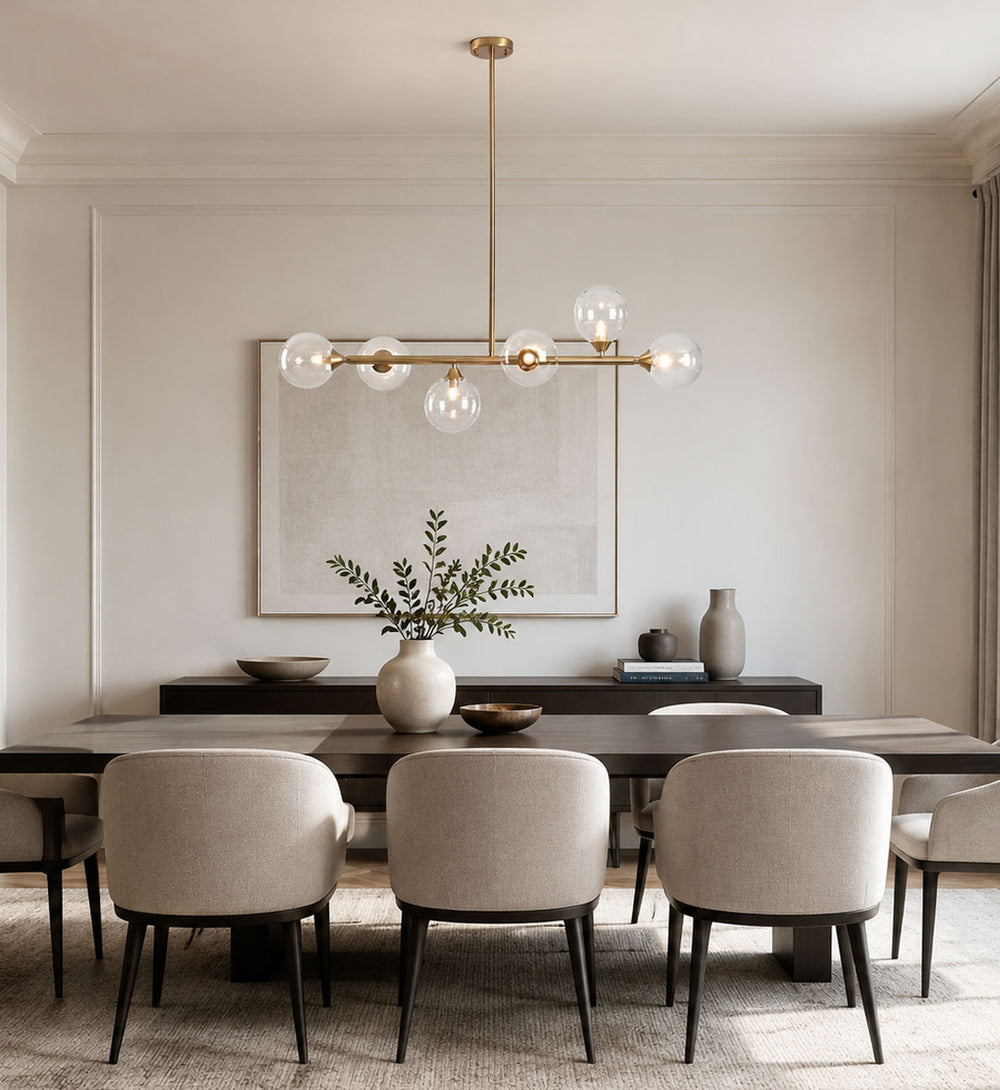 Calla Glass Globe Pendant Ceiling Light — Clear, Gold in a room
