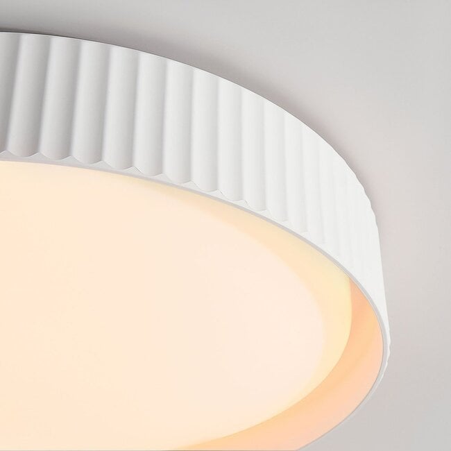How Senna Ribbed LED Flush Ceiling Light — Dimmable, White lights a room