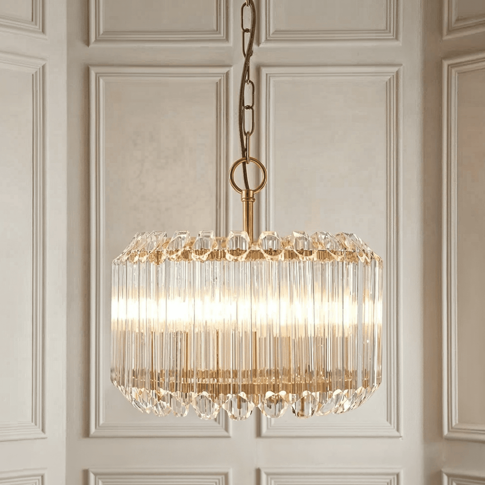 Veyra 3-Light Drum Pendant — Glass, Gold in a room