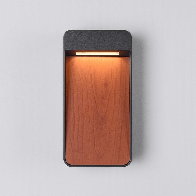 How Laska Contemporary Outdoor LED Wall Light — Warm White, Wood & Anthracite lights a room
