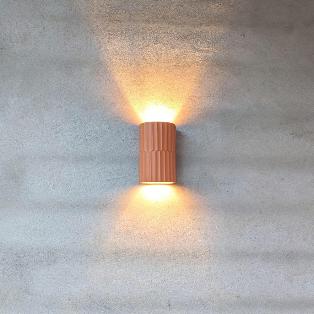 Terra Fluted Ceramic Wall Sconce — Terracotta, Handmade in Portugal in a room