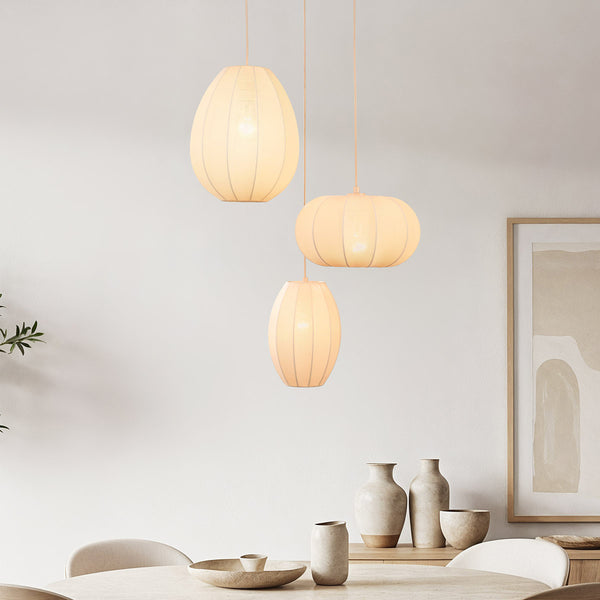 Lantana triple fabric lantern pendant light in warm beige hanging from ceiling