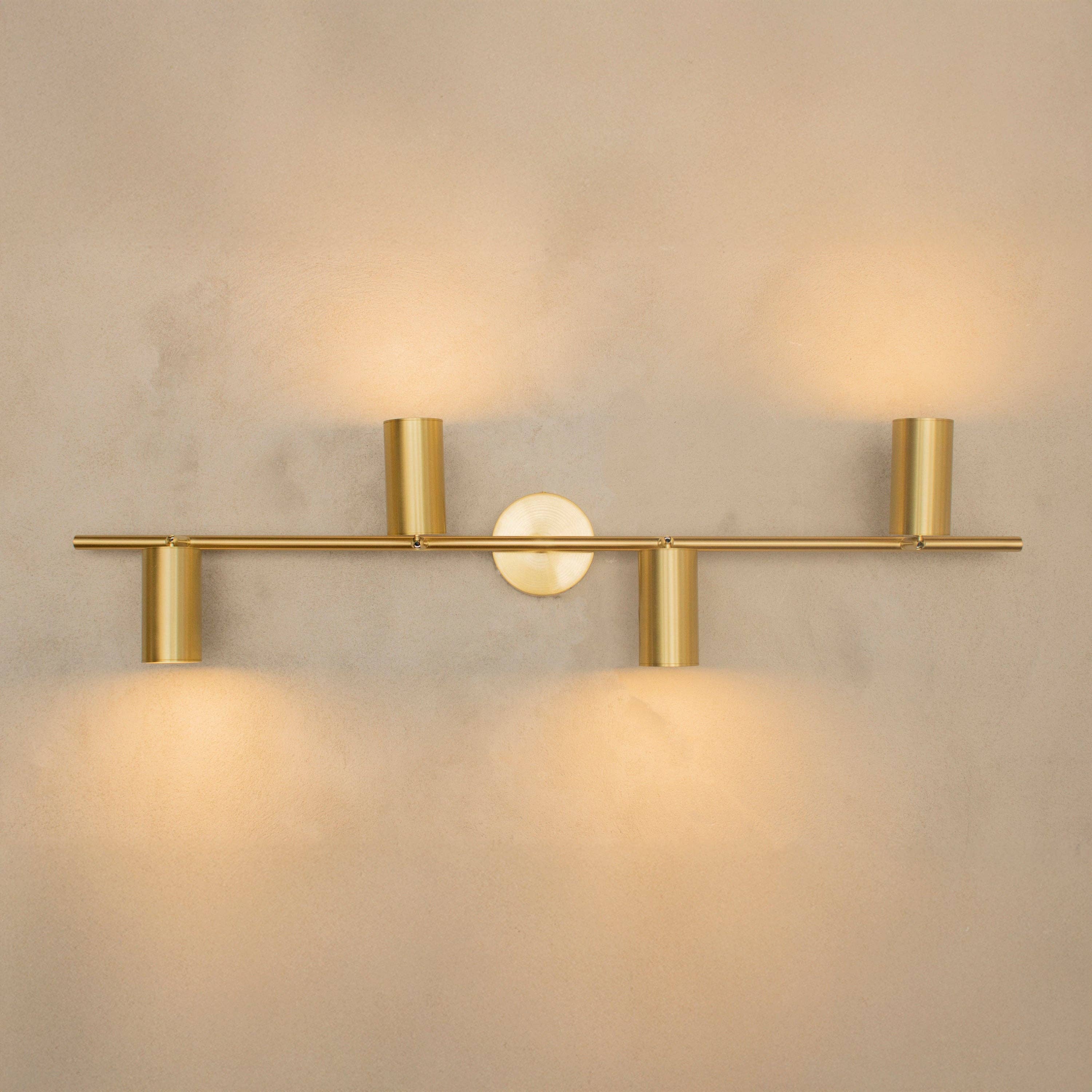 Koza 4-piece antique wall light set in living room setting