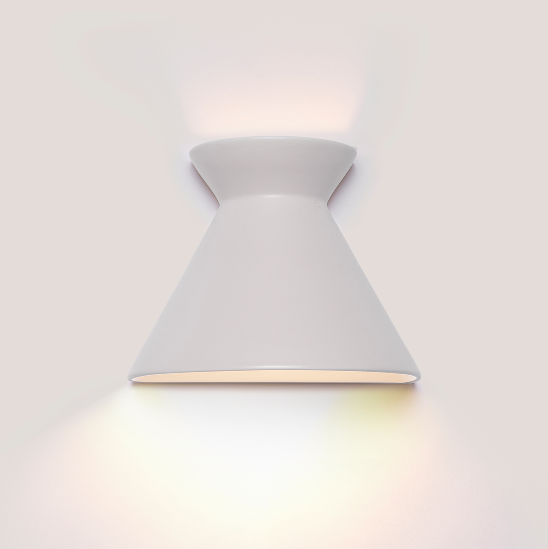 Kiro large pure white ceramic wall light casting light up and down
