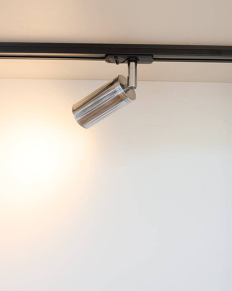 Adjustable track spotlight showing directional lighting capability
