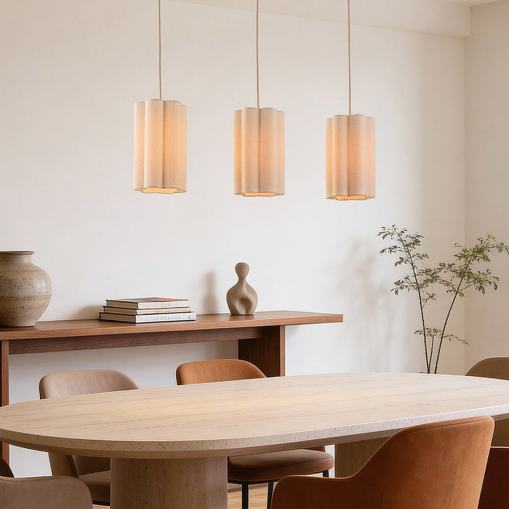 Liora beige linen 3-light pendant light hanging in modern dining room