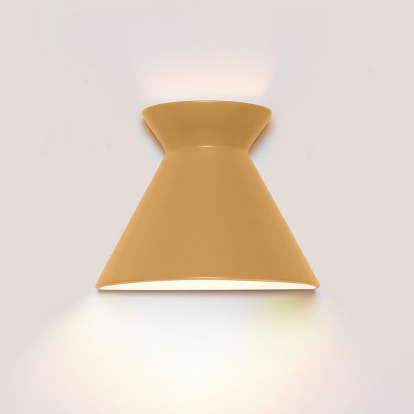 Kiro small babouche yellow ceramic wall light casting light up and down