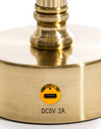 Close-up of brass finish and black shade detail on Lira cordless table lamp