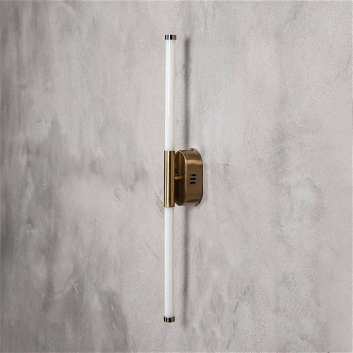 Akra minimalist wall light installed showing soft ambient lighting effect