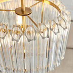 Coltrane 3 light pendant fitted above dining table showing illumination