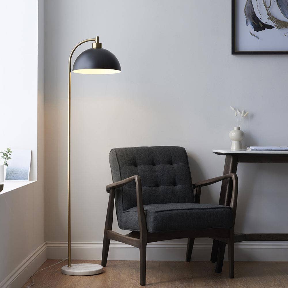 Aimee black and gold task floor lamp with marble base in modern living room