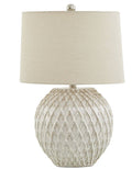 Cream lattice ceramic table lamp with natural linen shade on side table