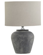 Amalfi grey table lamp with natural linen shade on bedside table