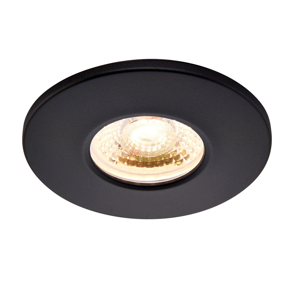 Close-up of slim matt black LED downlight showing fire rating
