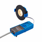 Matt black switchable colour temperature downlight in modern interior