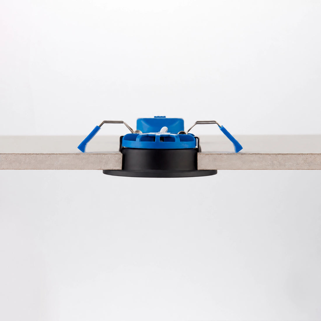 Valtari matt black downlight part-recessed showing its slim low-profile housing