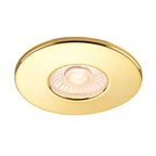 Close up of polished brass slim downlight showing warm metallic finish
