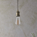 Close-up of double spiral decorative filament in dimmable LED bulb