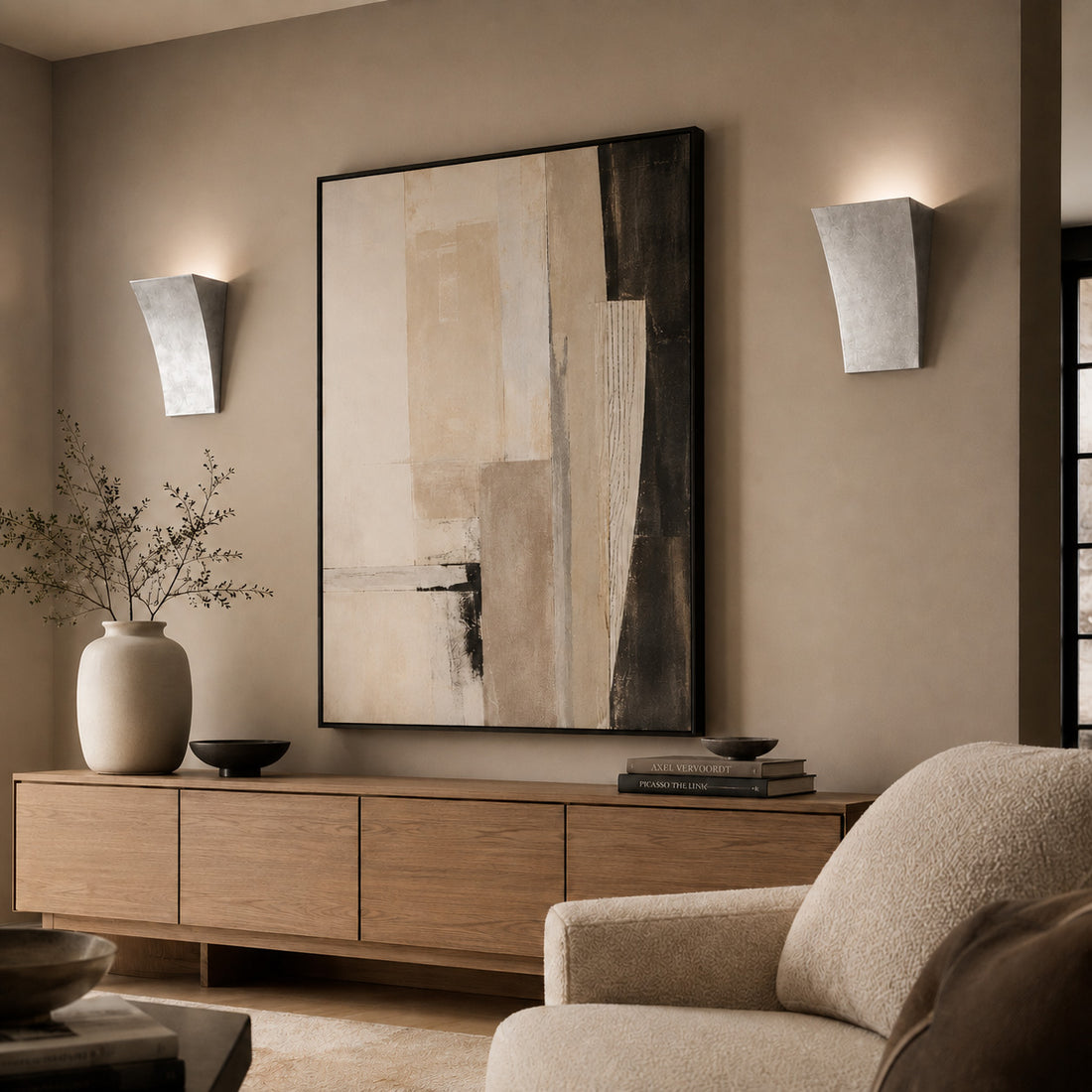 Pair of Alma silver leaf wall lights flanking large abstract art