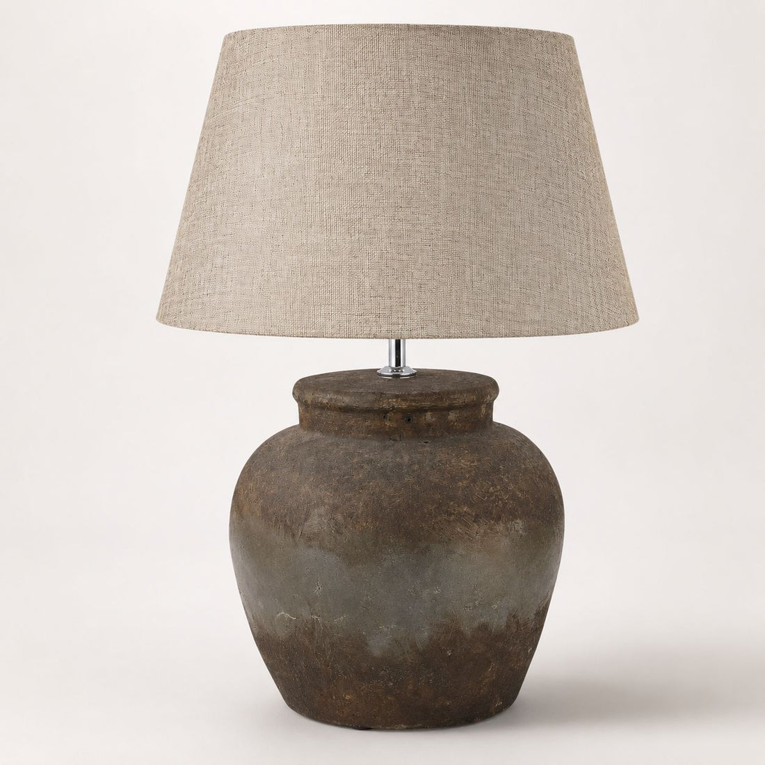 Castello aged stone urn table lamp with natural linen shade, on white