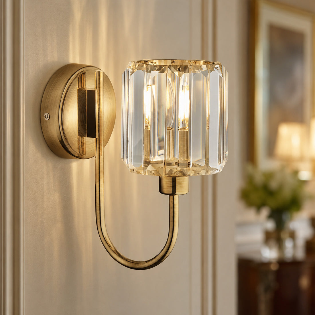 How Cortona Faceted Glass Wall Light — Antique Brass lights a room