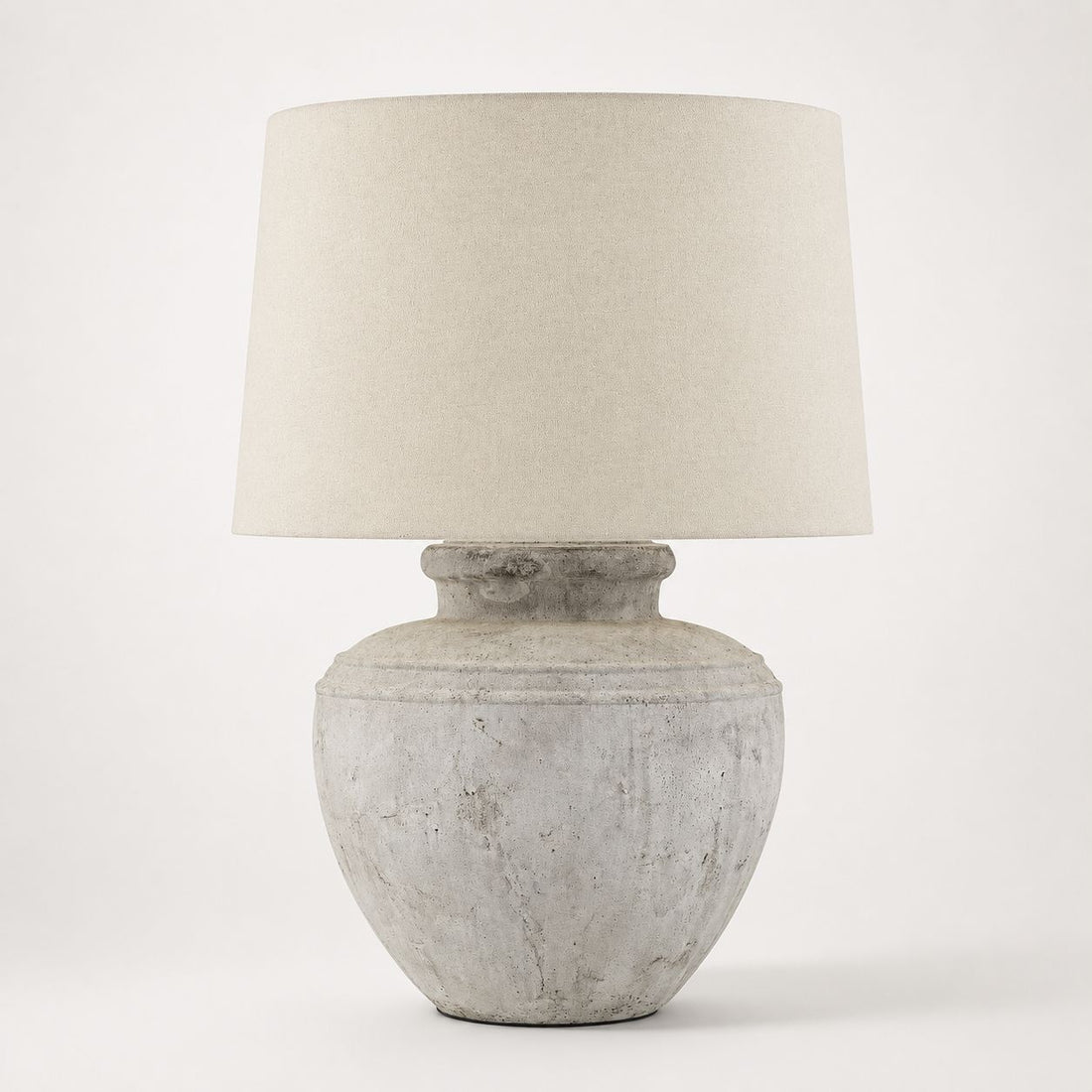 Darcy Chorus antique white stone-effect table lamp with linen shade, on white