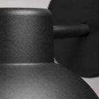 Hadsten matt black outdoor wall light, close-up of the arm and dome