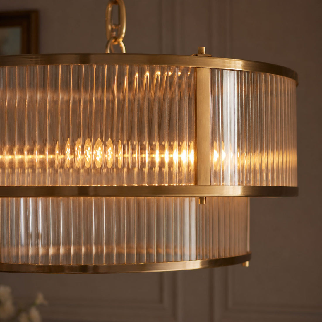How Halo 5-Light Ribbed Drum Pendant — Glass, Antique Brass lights a room