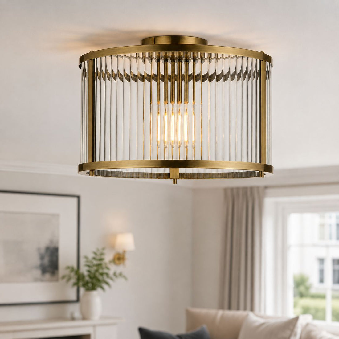 Halo antique brass ribbed glass flush light lit on a living room ceiling