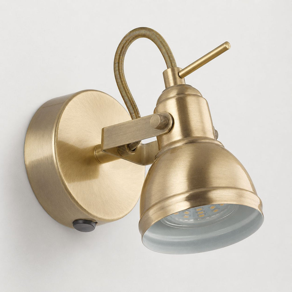 Harlow antique brass industrial wall spot light with toggle switch, on white