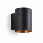 Jen round black and gold up down wall light, front view on white