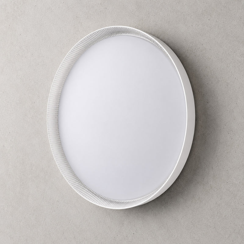 Kaos 50cm round LED ceiling light in white with ribbed trim, lit cool white