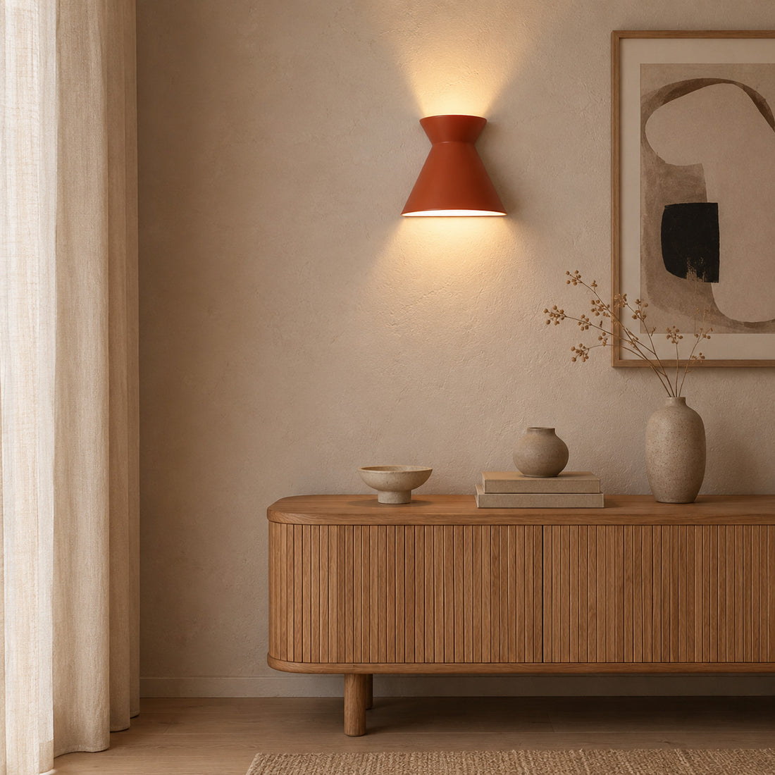Kiro small burnt orange wall light above a low oak media cabinet