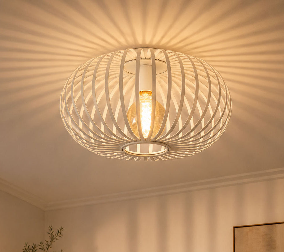 Ceiling light fixture casting a warm glow in a living room.