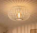 Ceiling light fixture casting a warm glow in a living room.