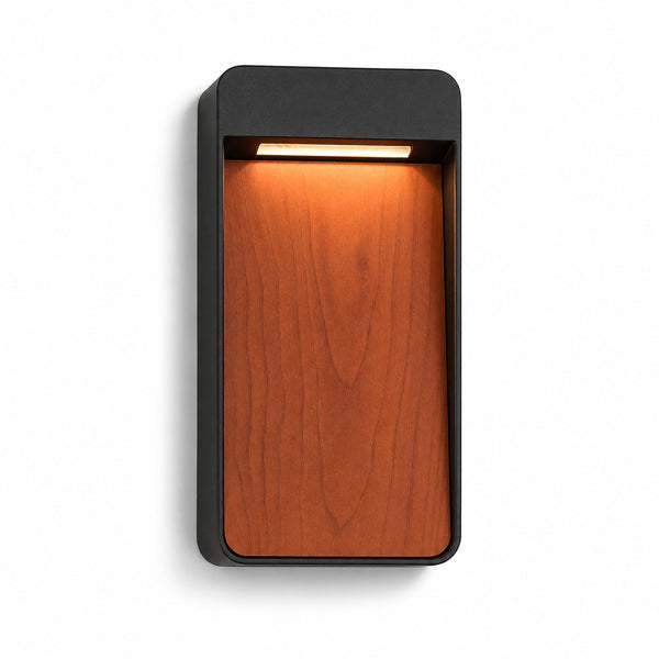 Laska anthracite outdoor LED wall light with vertical wood-effect panel, angled view on white