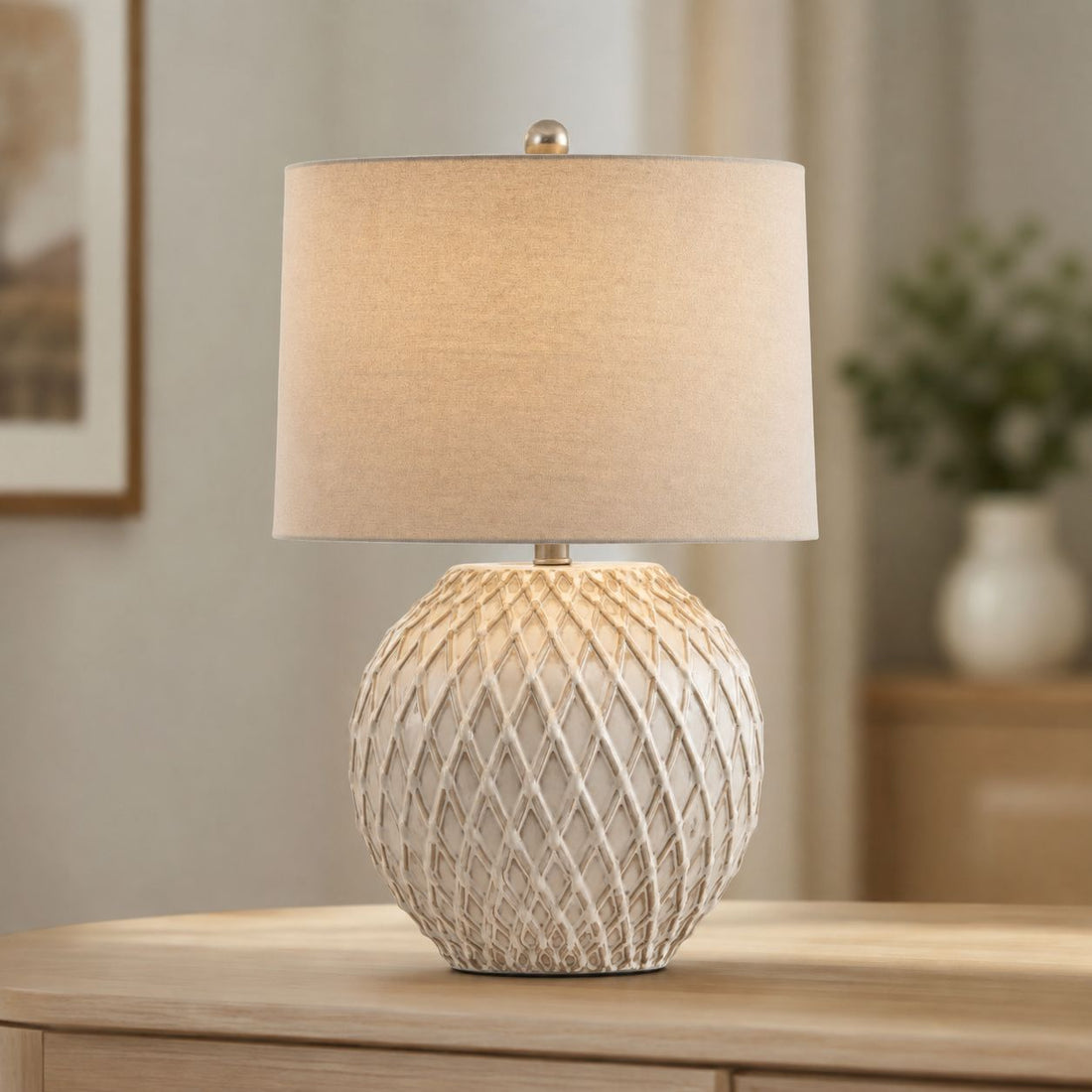 Lattice cream lattice-pattern ceramic table lamp on a wooden side table