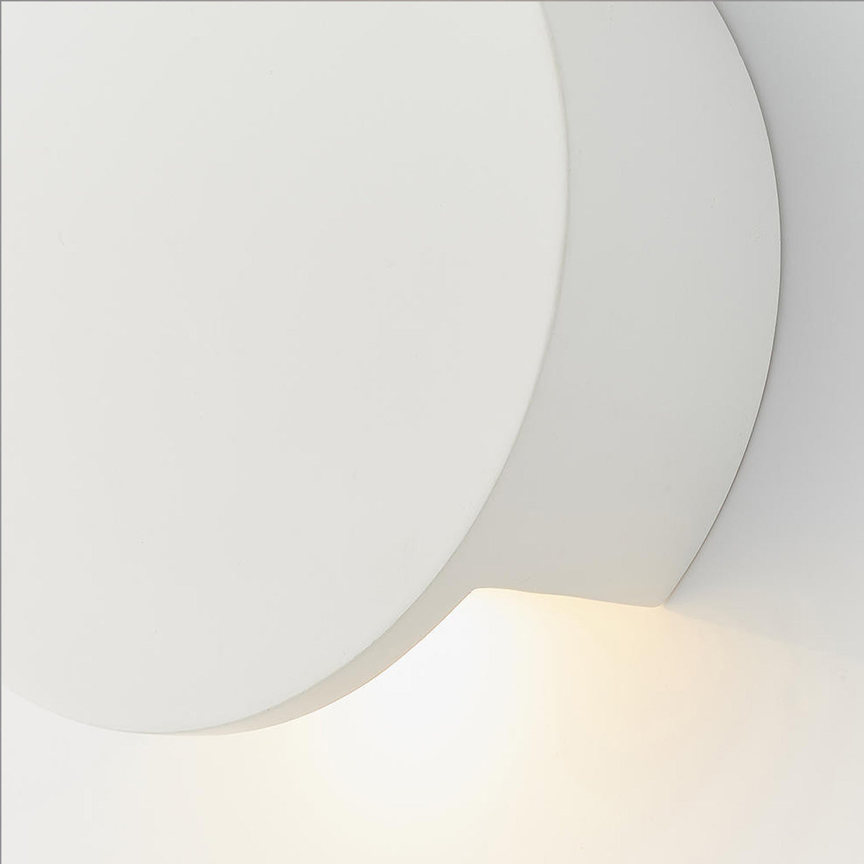 Leiron Round Wall Light — Paintable White Plaster, Up & Down