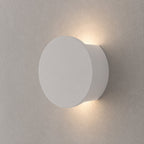 Leiron Round Wall Light — Paintable White Plaster, Up & Down