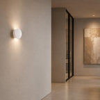 Leiron Round Wall Light — Paintable White Plaster, Up & Down