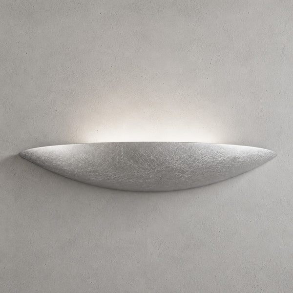 Livigno silver leaf plaster uplighter washing light up a textured wall