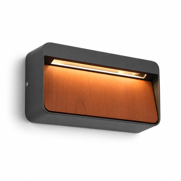 Loren anthracite LED outdoor wall light with wood-effect front panel, angled view on white