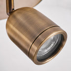 Lucca triple spot light, close-up of an antique brass GU10 spotlight head