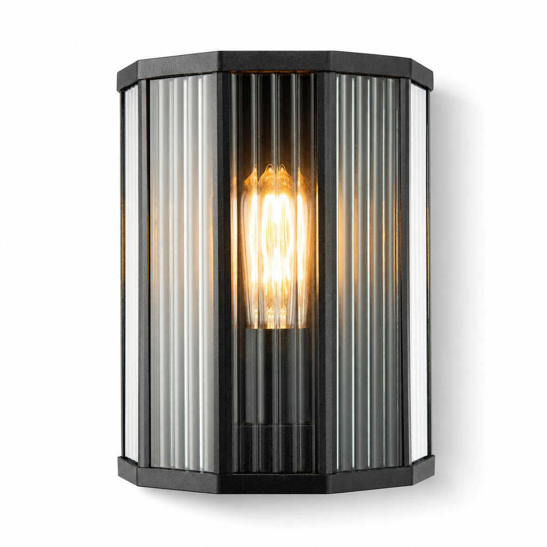 Filament bulb glowing through the half lantern's clear ribbed glass