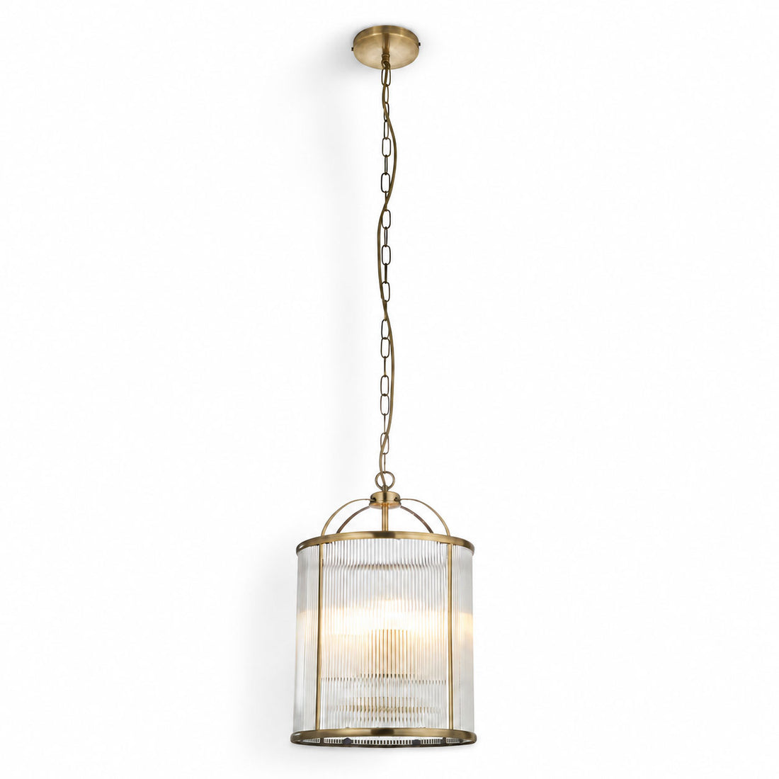 Solene ribbed glass ceiling pendant in antique brass, lit lantern on chain