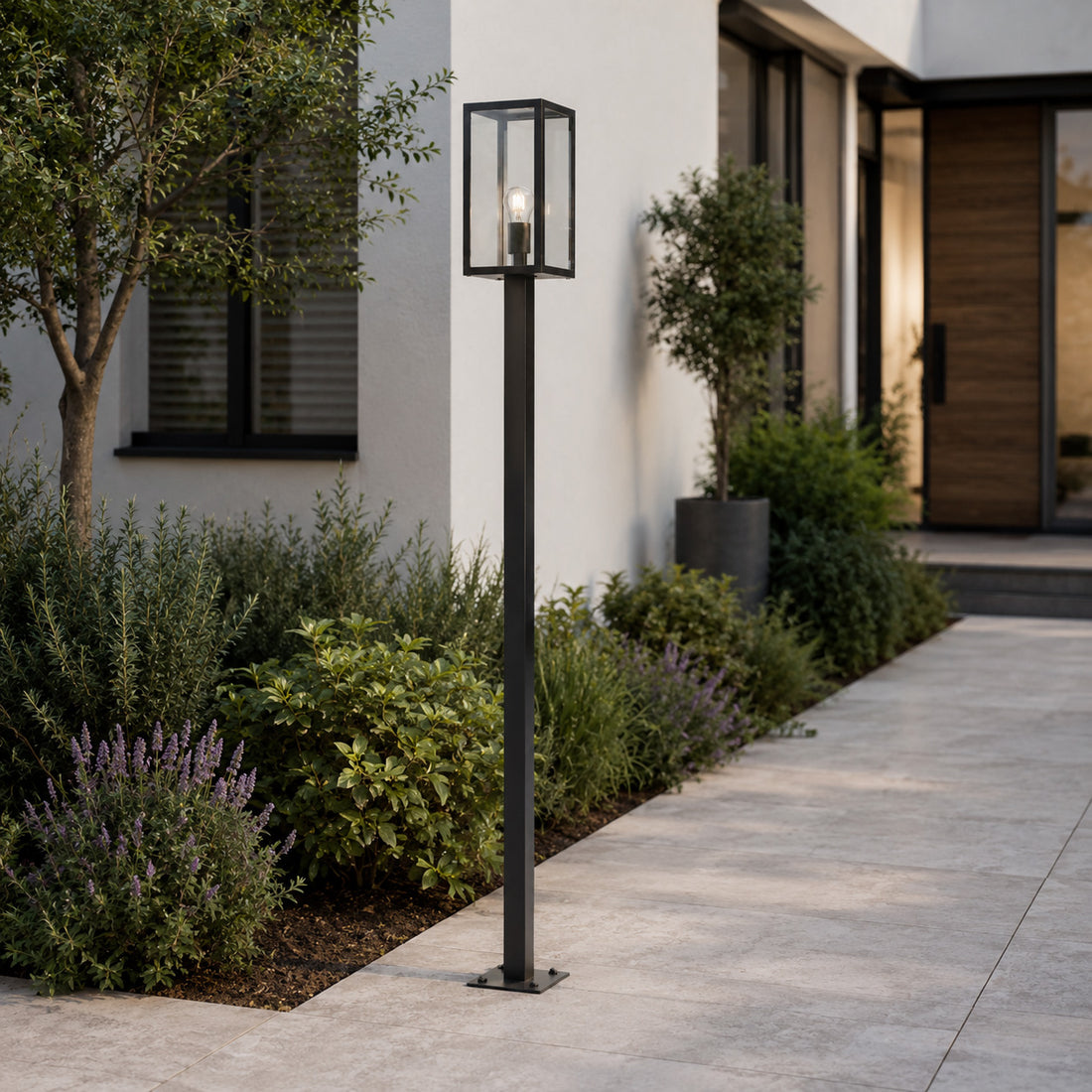 Mirage 2m lantern post light beside a modern driveway with planting