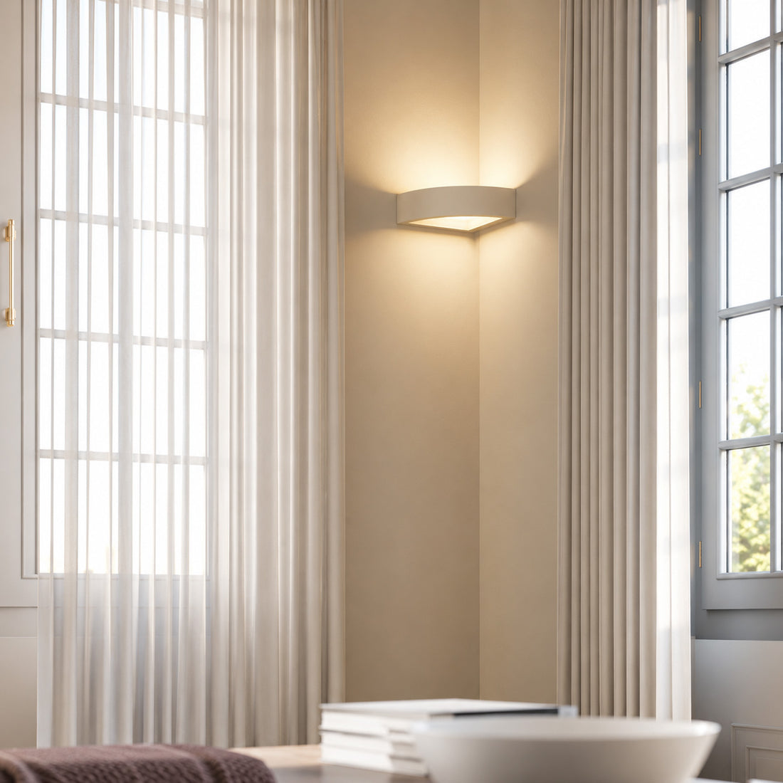 Mykonos corner light washing warm light between curtained windows