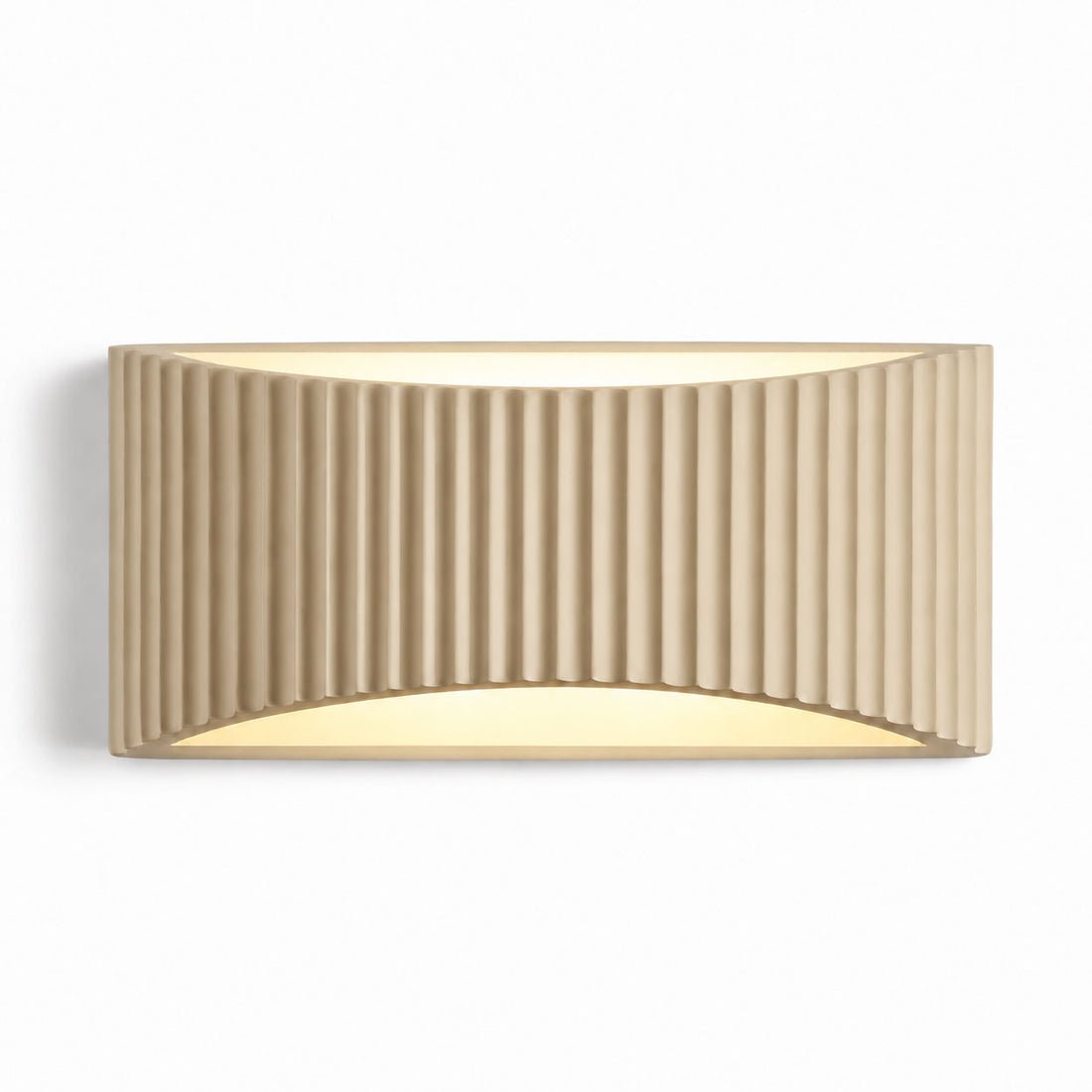 Ribbed wave ceramic wall light lit, cream tone front view